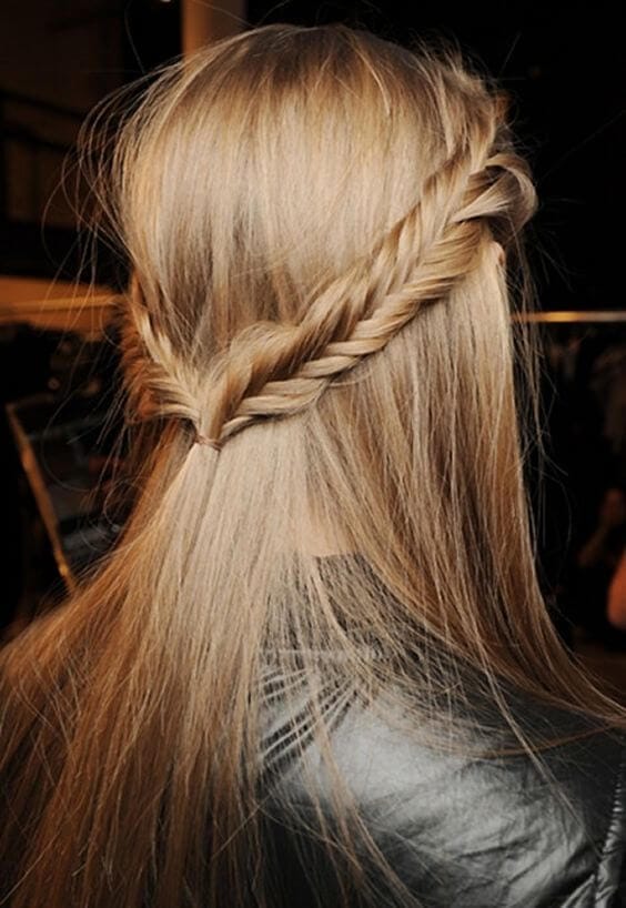Half up half down bun features a beautifully braided twist design, elegantly intertwined for a soft, balanced look. Perfect for various occasions.