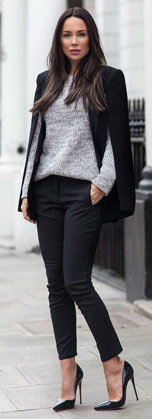 Sleek straight hair with a deep center part, paired with a gray knit sweater and tailored black blazer, ideal for winter office wear.