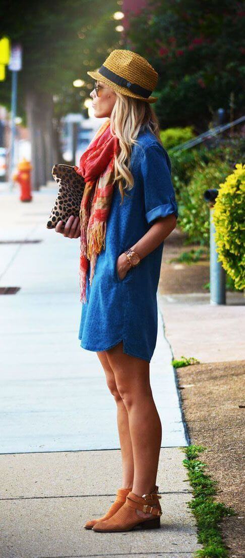 Silk scarf styled around the neck, enhancing a chic summer outfit. Perfect for adding flair to casual looks.
