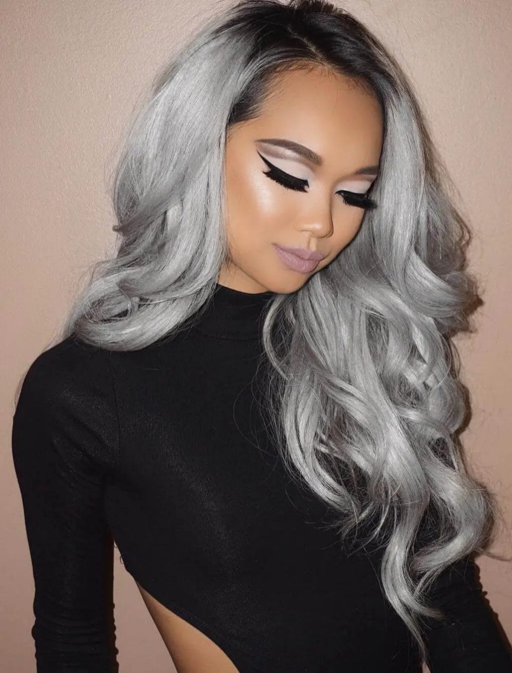 Pristine silver hue with subtle layers and soft, flowing waves for a chic, ethereal appearance.