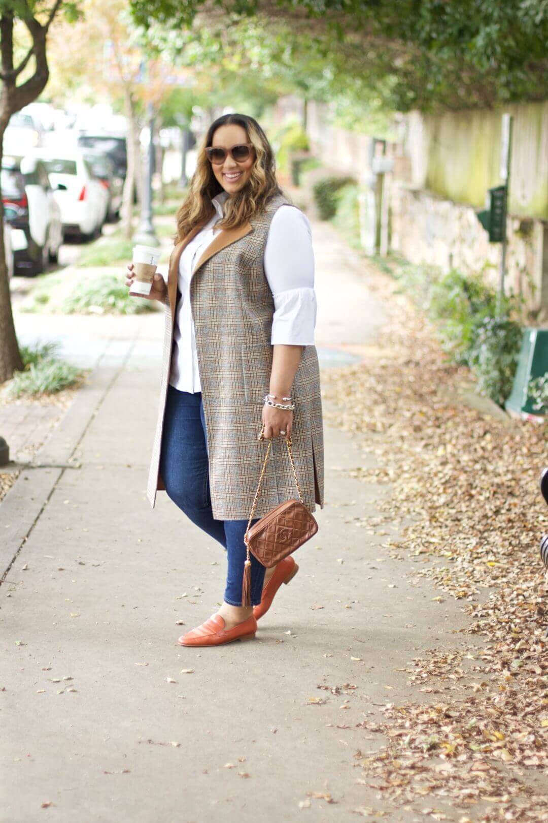 Plus size office outfit featuring a stylish, relaxed look with loose, cascading waves. Perfect for business casual settings.