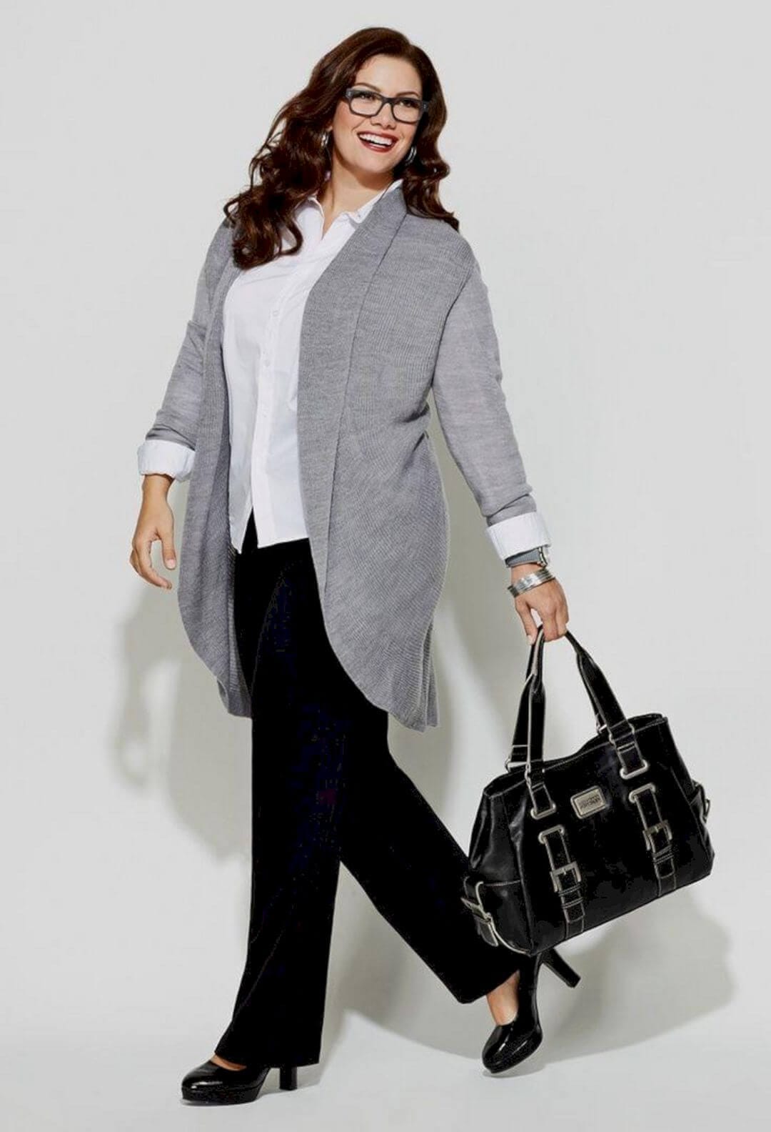 Gray open-front cardigan layered over a white button-up shirt, paired with black wide-legged trousers and a stylish black handbag. Perfect for plus size office wear.
