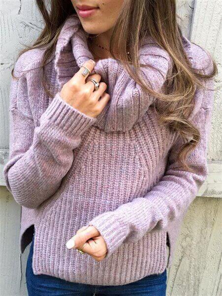 Soft lavender sweater with a cowl neck and mid-forearm sleeves, perfect for cozy pastel outfit ideas in spring.