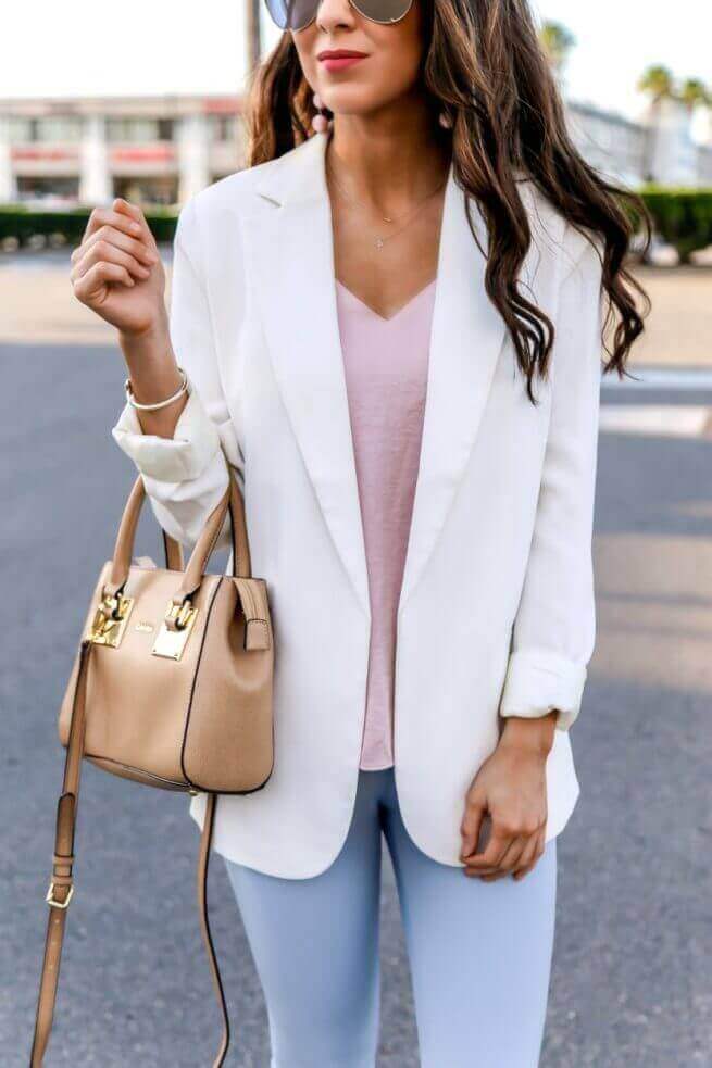 Soft girl aesthetic outfit featuring a pastel color palette. Loose waves frame the face, enhancing the relaxed, polished look.