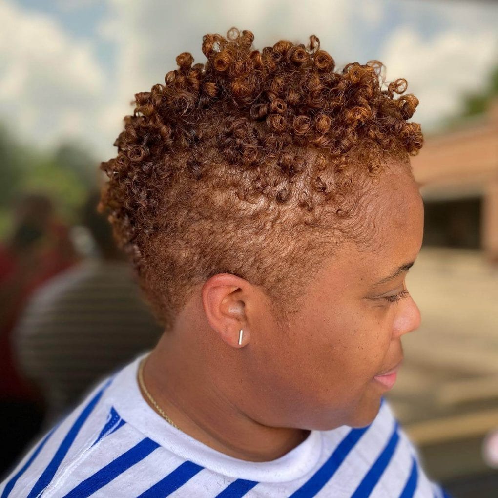 Chic short crop with bold colored tight curls.