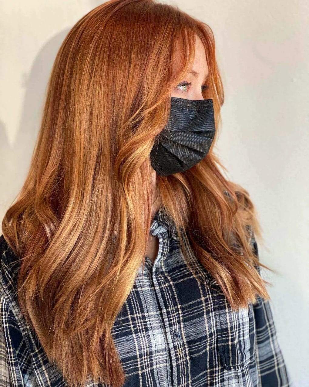 Smooth gradient from rich copper to golden blonde waves.