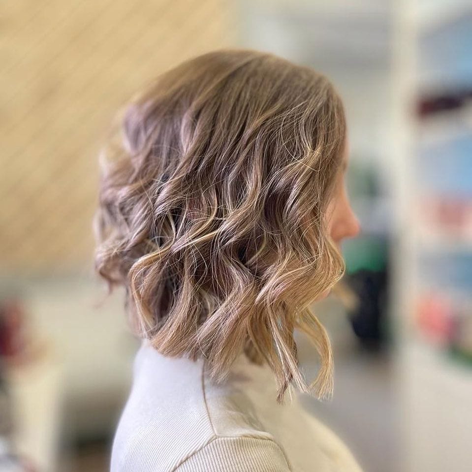 Shoulder-skimming lob, soft lavender and ash blonde tones.