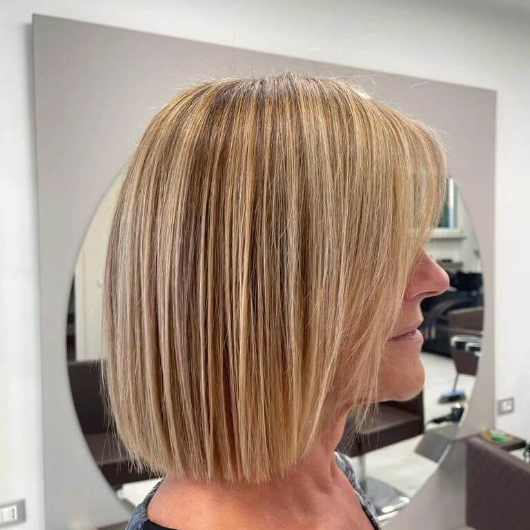 Elegant honey and platinum highlights bob.