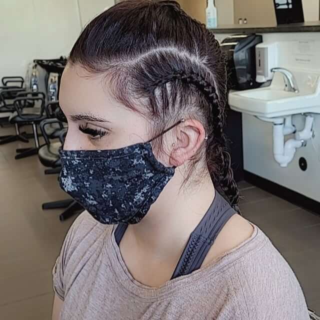 Espresso brown hair in a neat, side Viking braid.