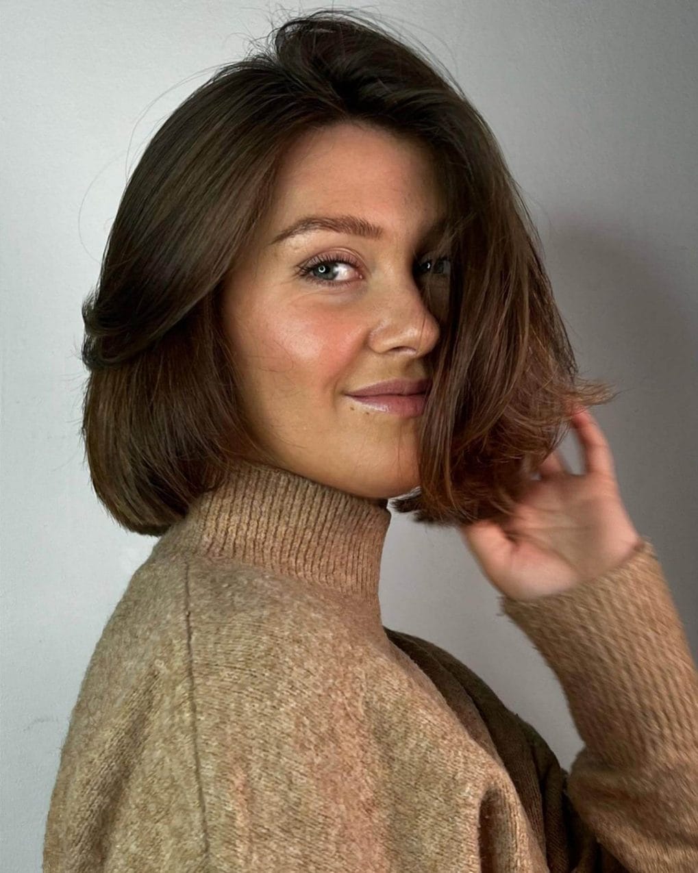 Subtle layered chocolate brown Italian bob.