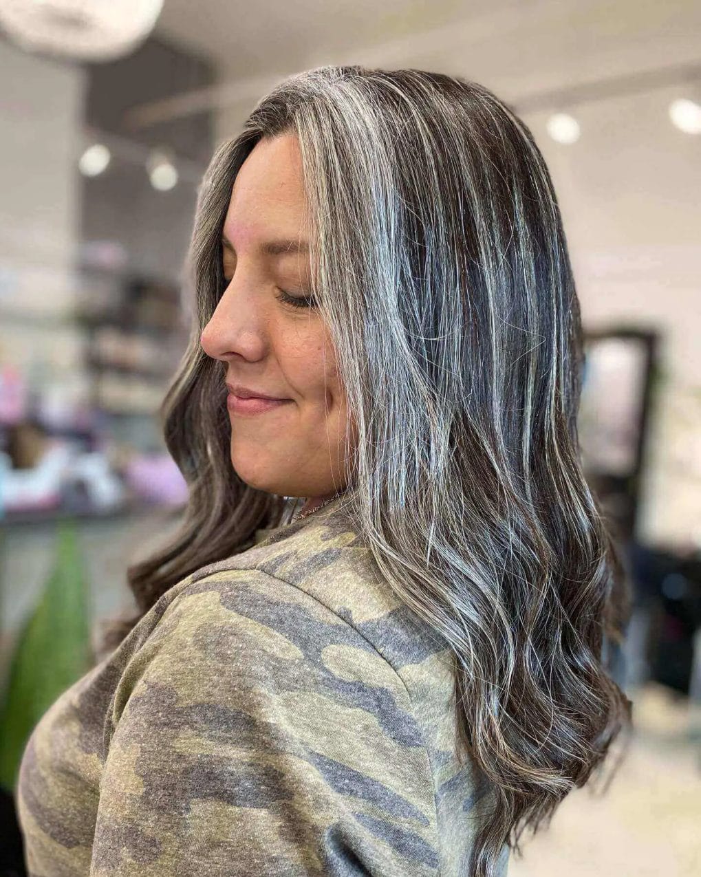 Sophisticated long layers blending natural gray and charcoal tones.