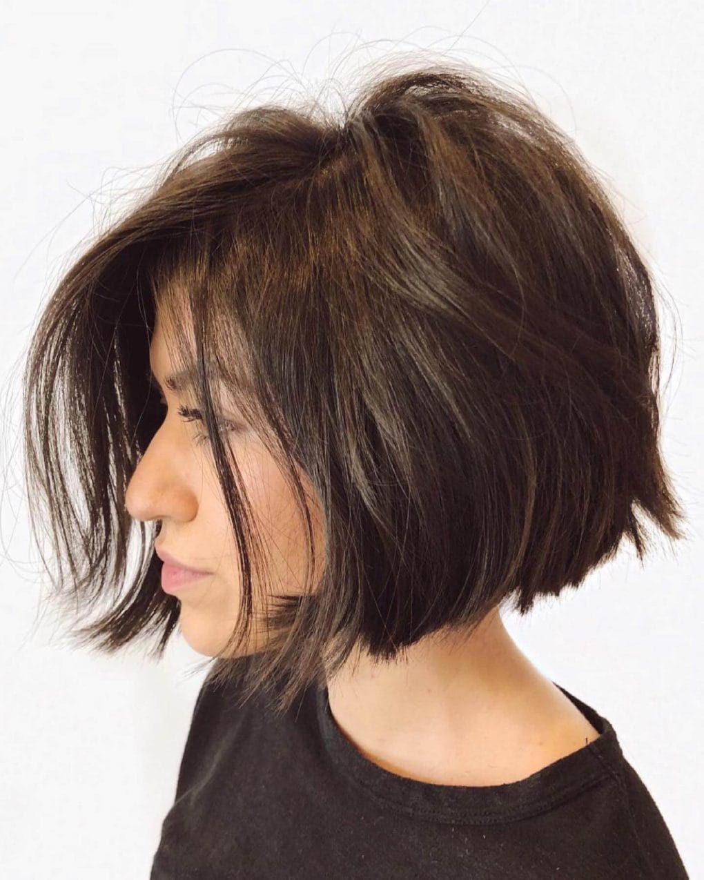 Asymmetric bob for thick hair with side fringe.