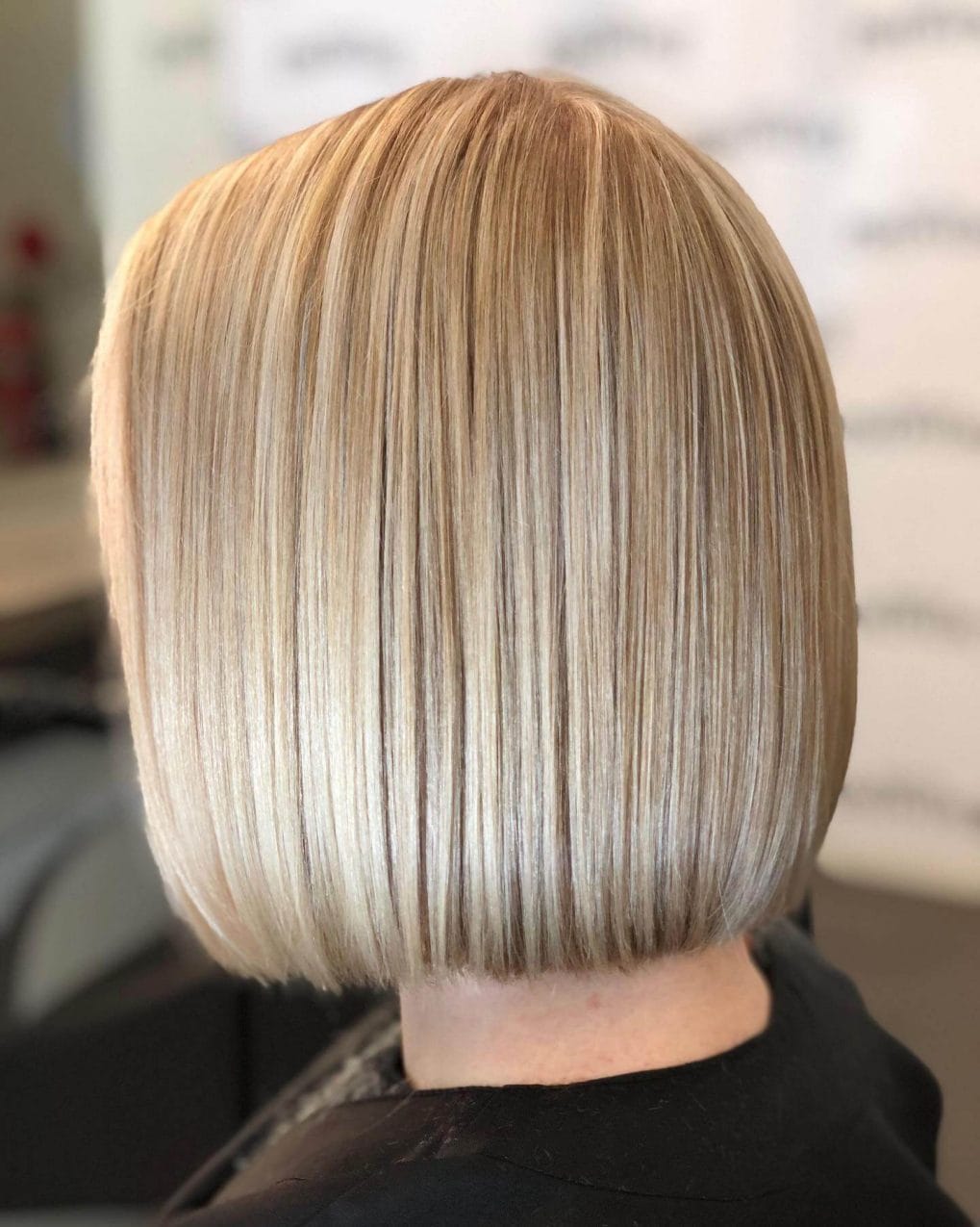 Sleek modern platinum blonde Italian bob.