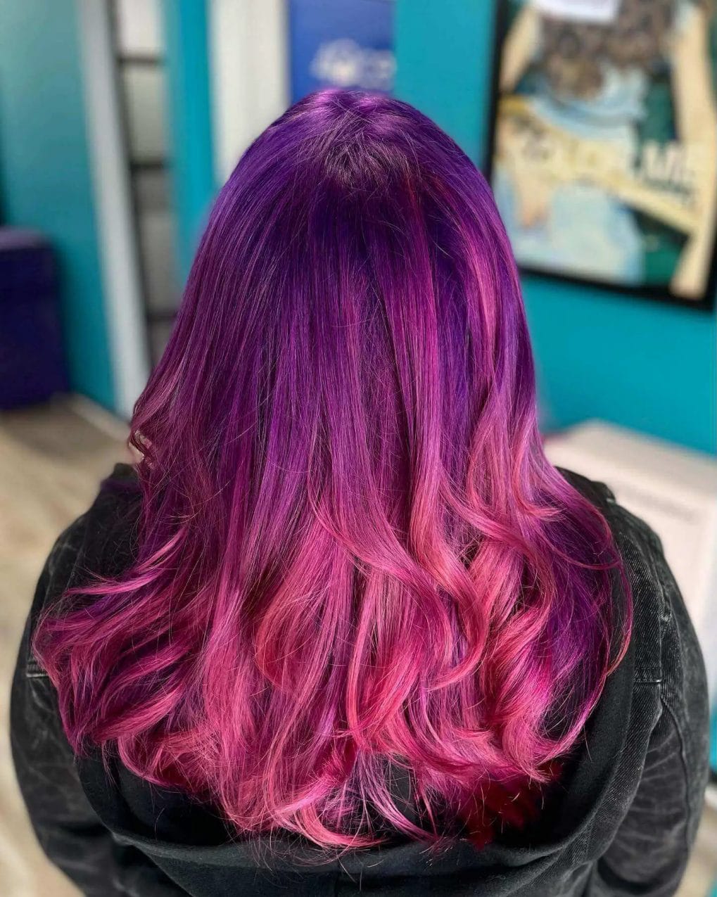 Royal purple to vibrant magenta long layered curls.