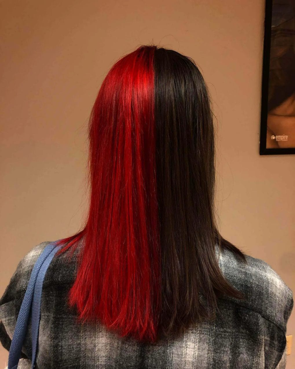 Radiant ruby red and natural dark split dye in mid-length style.