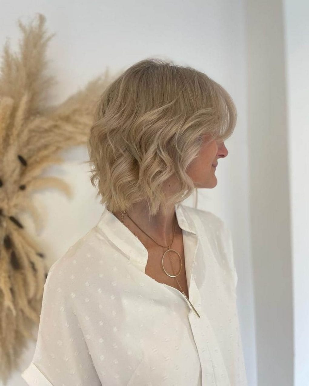 Effortless sandy blonde beachy waves in bob.