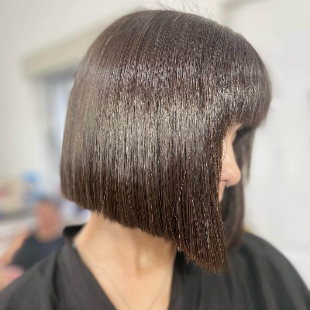 Sleek angular bob with defined lines and fringe.