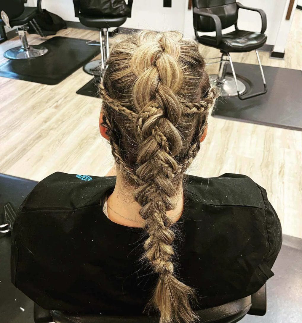 Soft blonde French Viking braid flowing into a classic plait.
