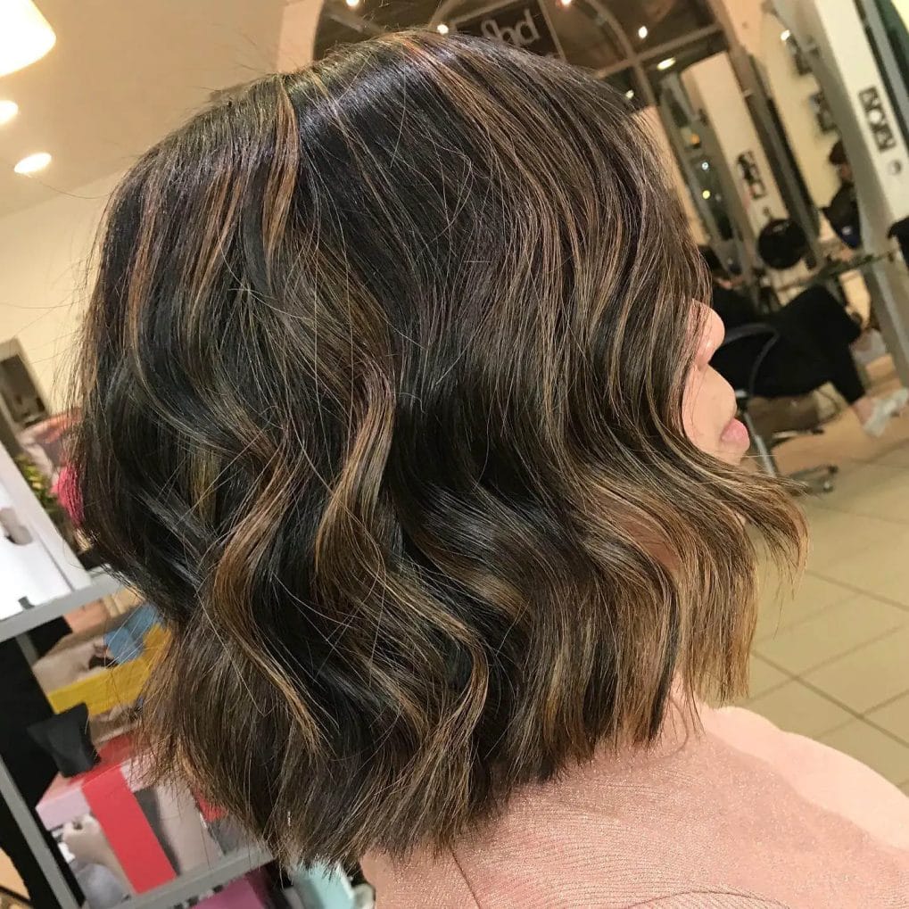 Multi-tonal bob with soft waves and subtle layers.