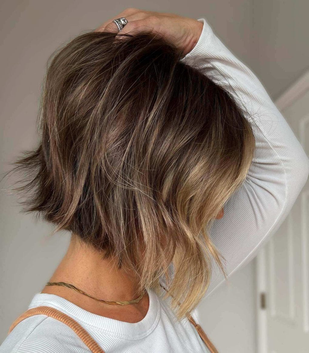 Textured bob, sun-kissed blonde balayage.