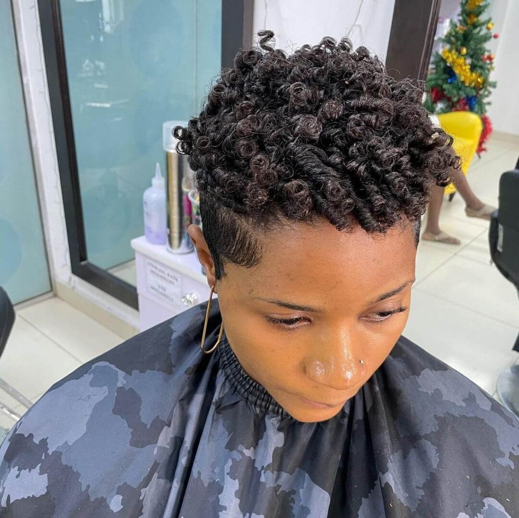Tightly curled tapered cut for natural volume.