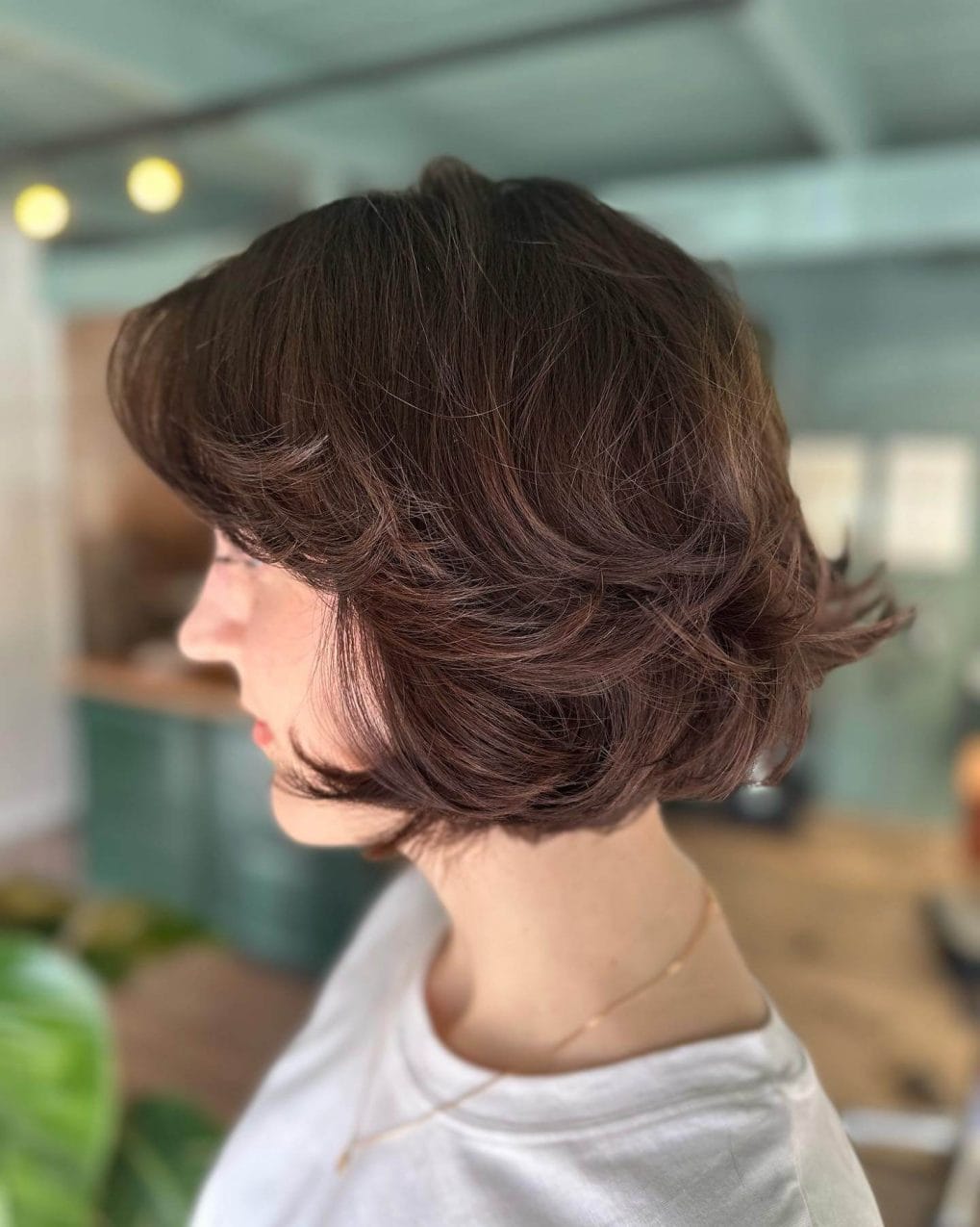 Voluminous chocolate and auburn bob.