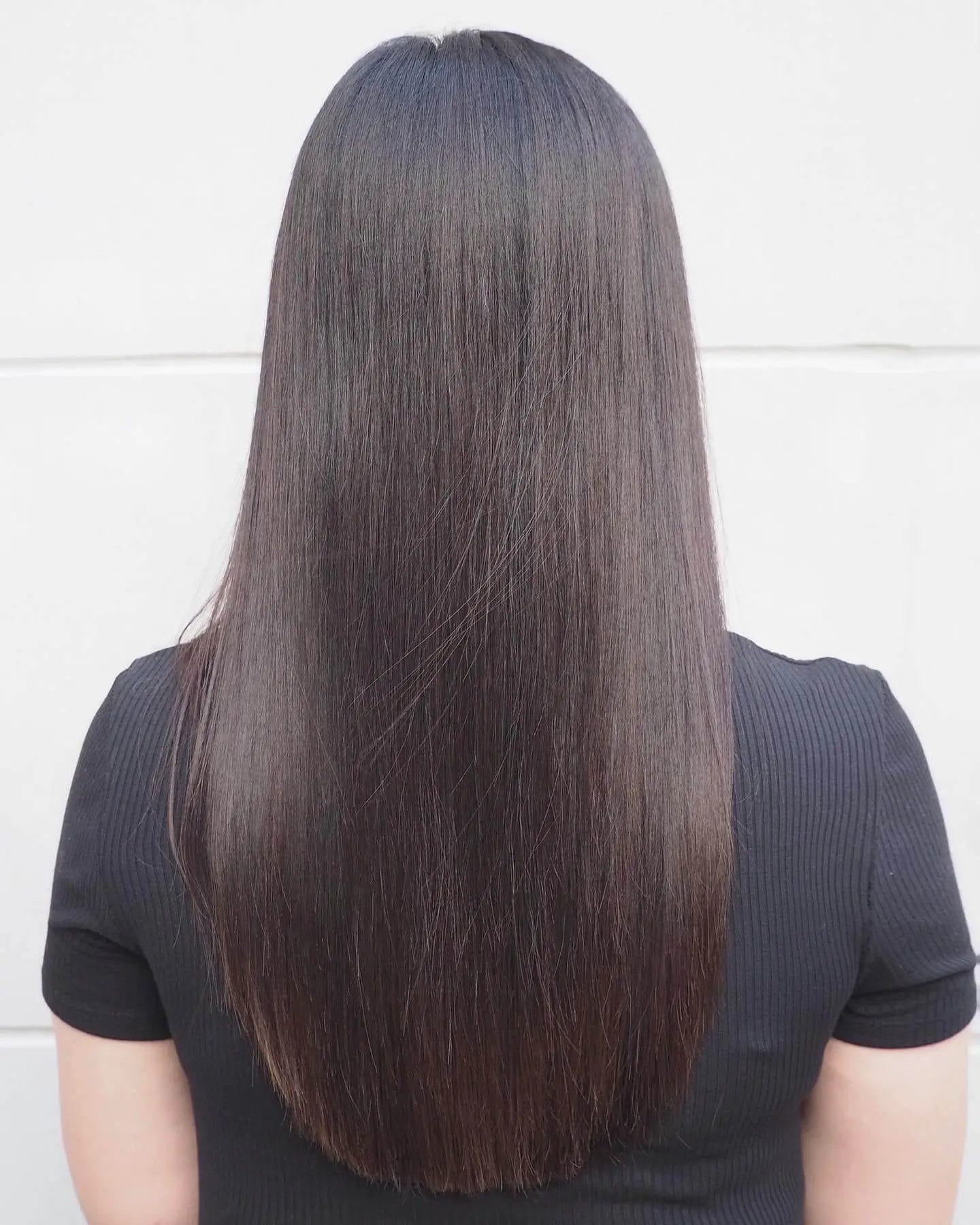 U-shaped hair transitioning from ash-brown to chestnut with a silky gradient effect.
