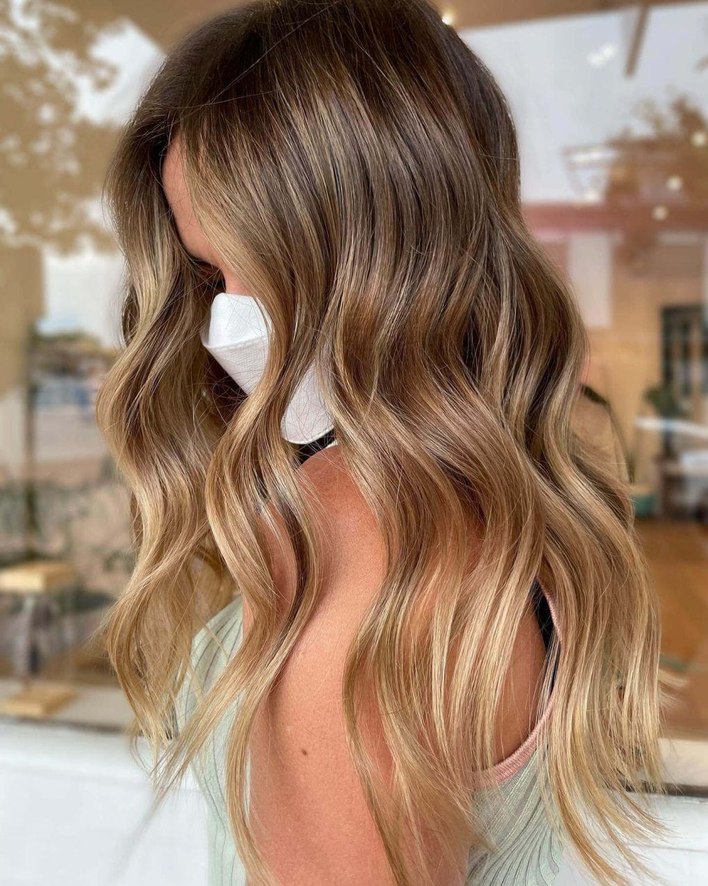 Dark ash to creamy blonde balayage, reflecting winter's softness and depth.