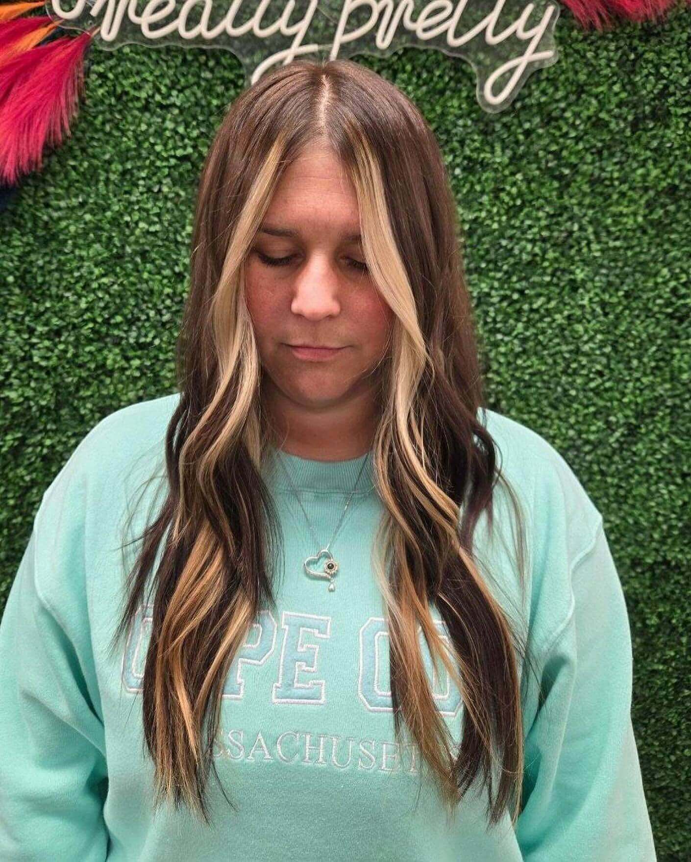 Long layers with balayage highlights and face-framing strands for school