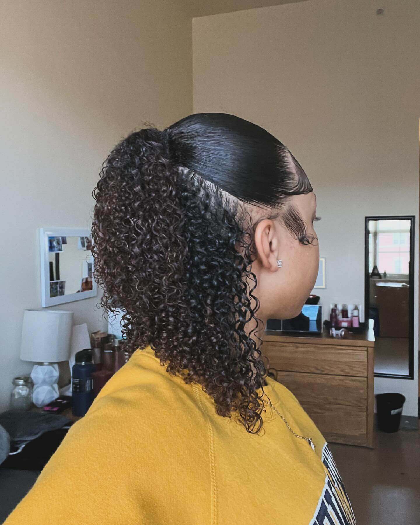 Chic half-up high ponytail on curly hair for a neat back-to-school style