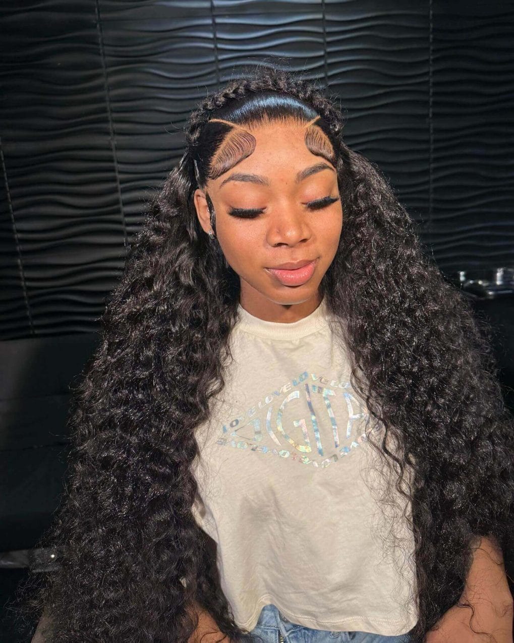 Wavy hair with frontal braids and swooped baby hairs