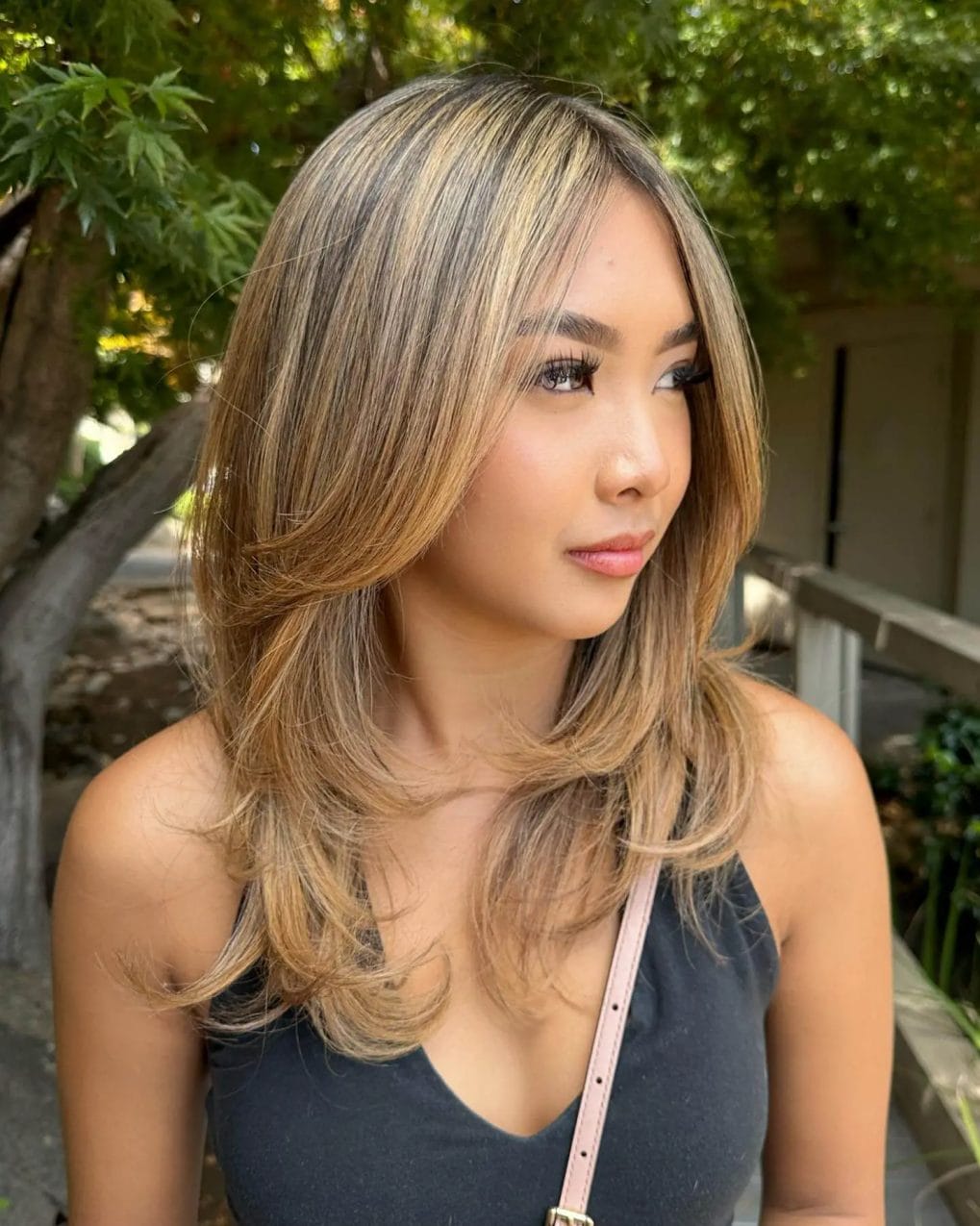 Flawlessly color-corrected blonde balayage with layers.