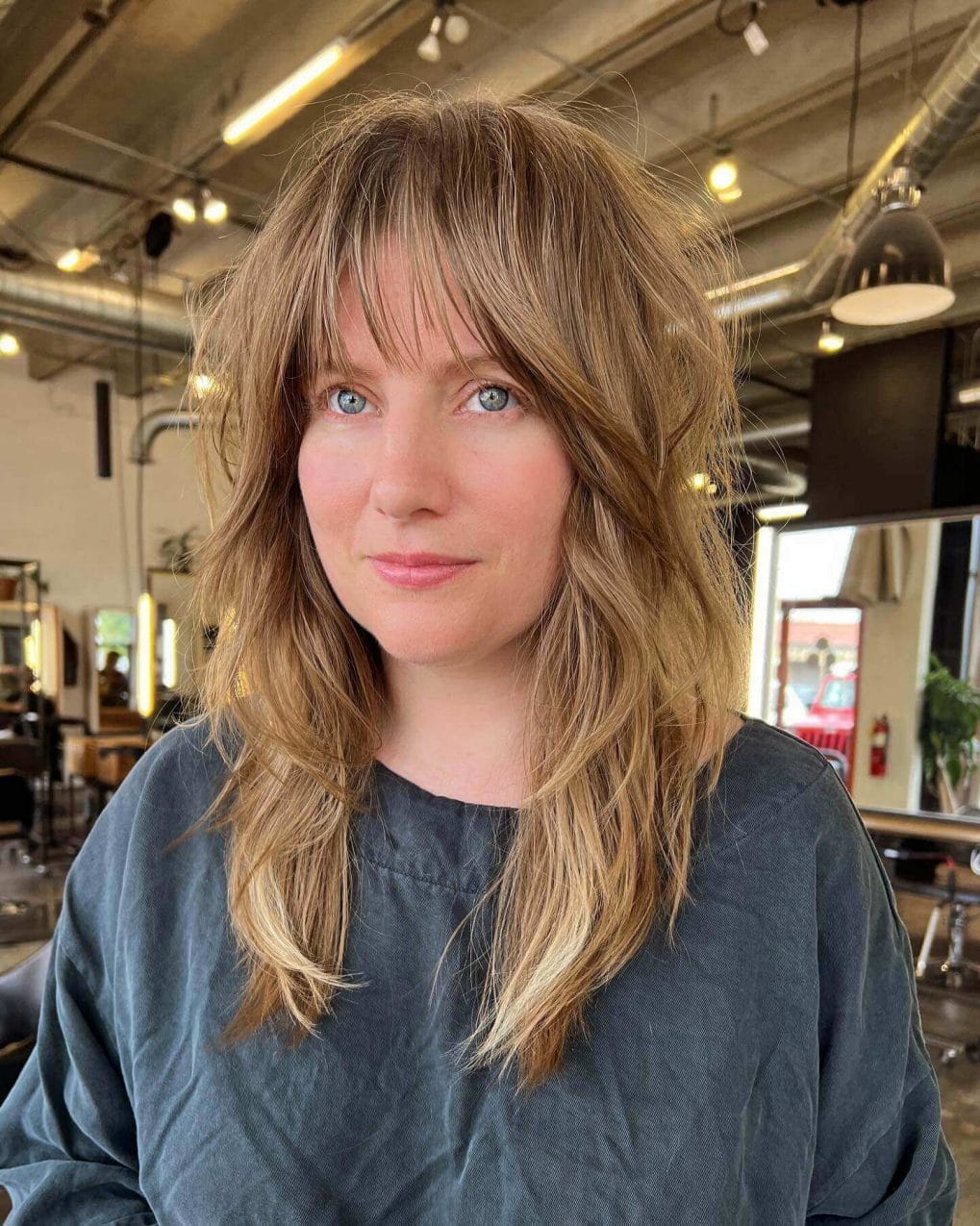 Blonde balayage hair with see-through bangs