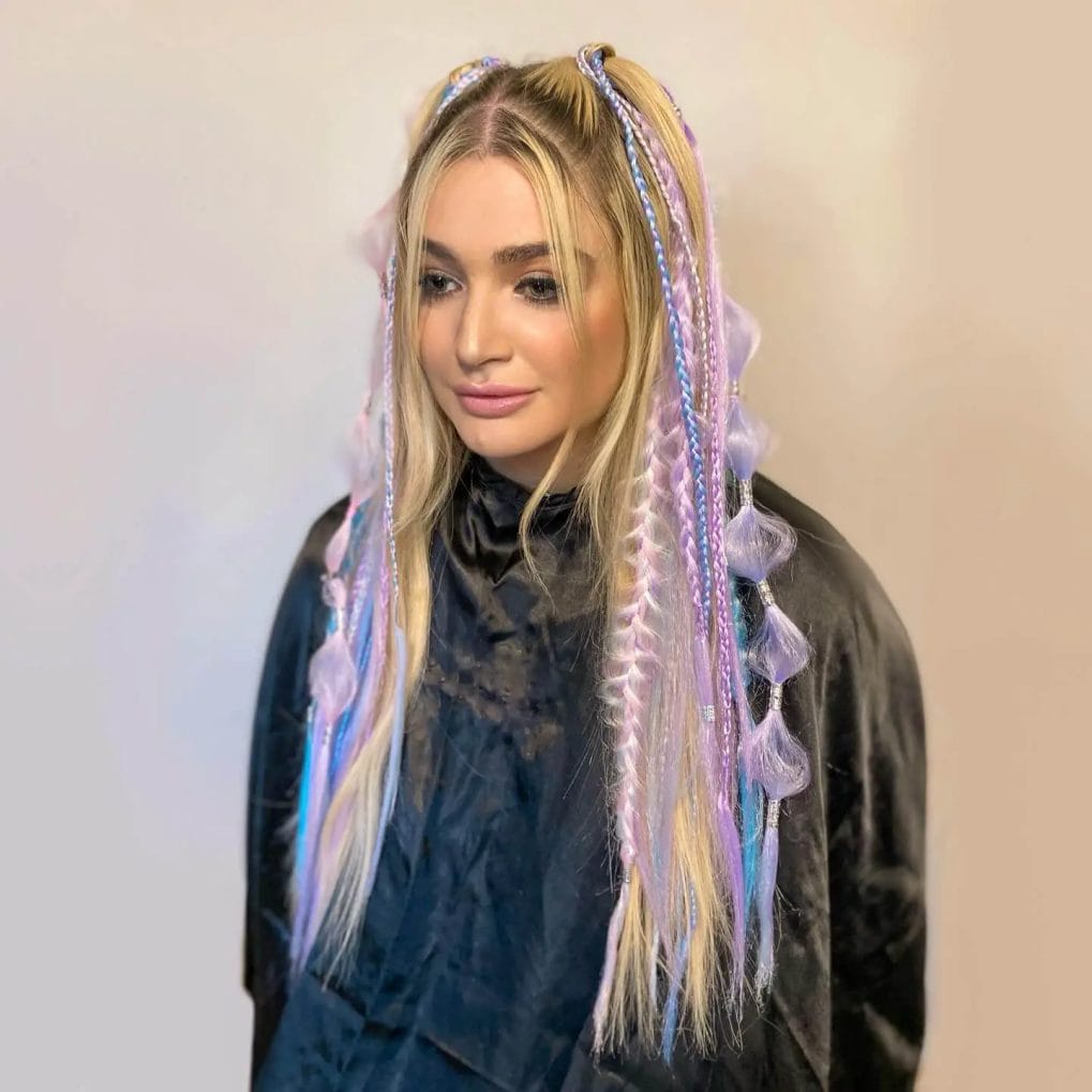 Blonde and pastel braids with a flowy, iridescent quality