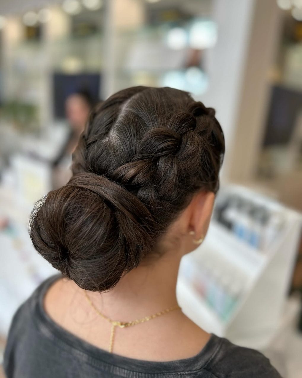 Neat braid circling head into a functional low bun