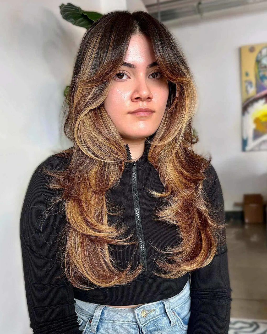 Brunette to honey blonde ombre waves with seamless bangs