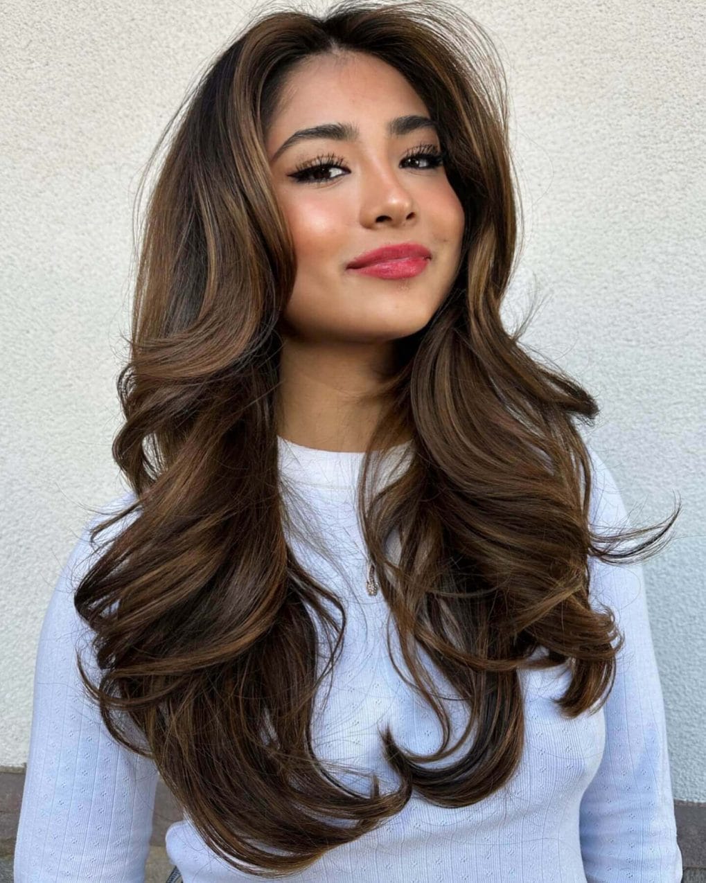 Butterfly Cut with voluminous layers for a light summer feel