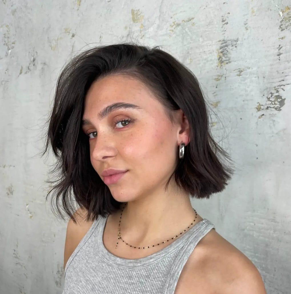 Casual waved French bob with deep side part