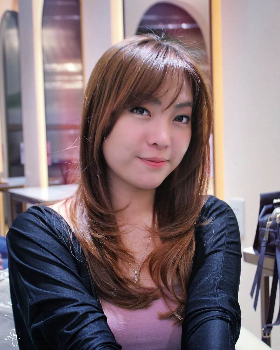 Chestnut brown layers with soft see-through bangs