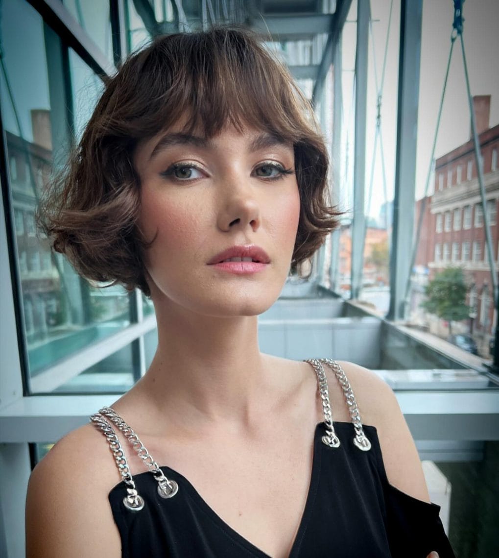 Chic French bob with voluminous bounce and jawline length