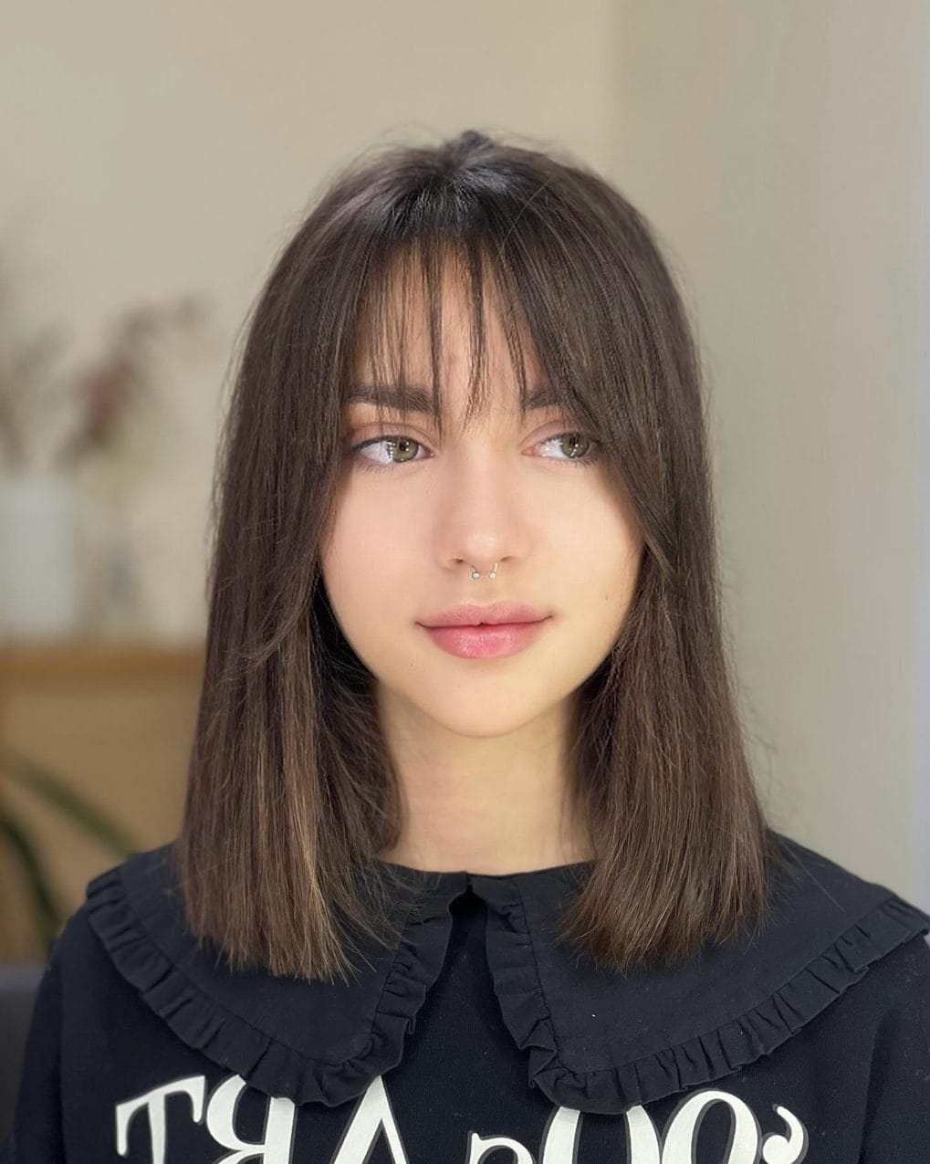 Straight chin-length bob with blunt fringe