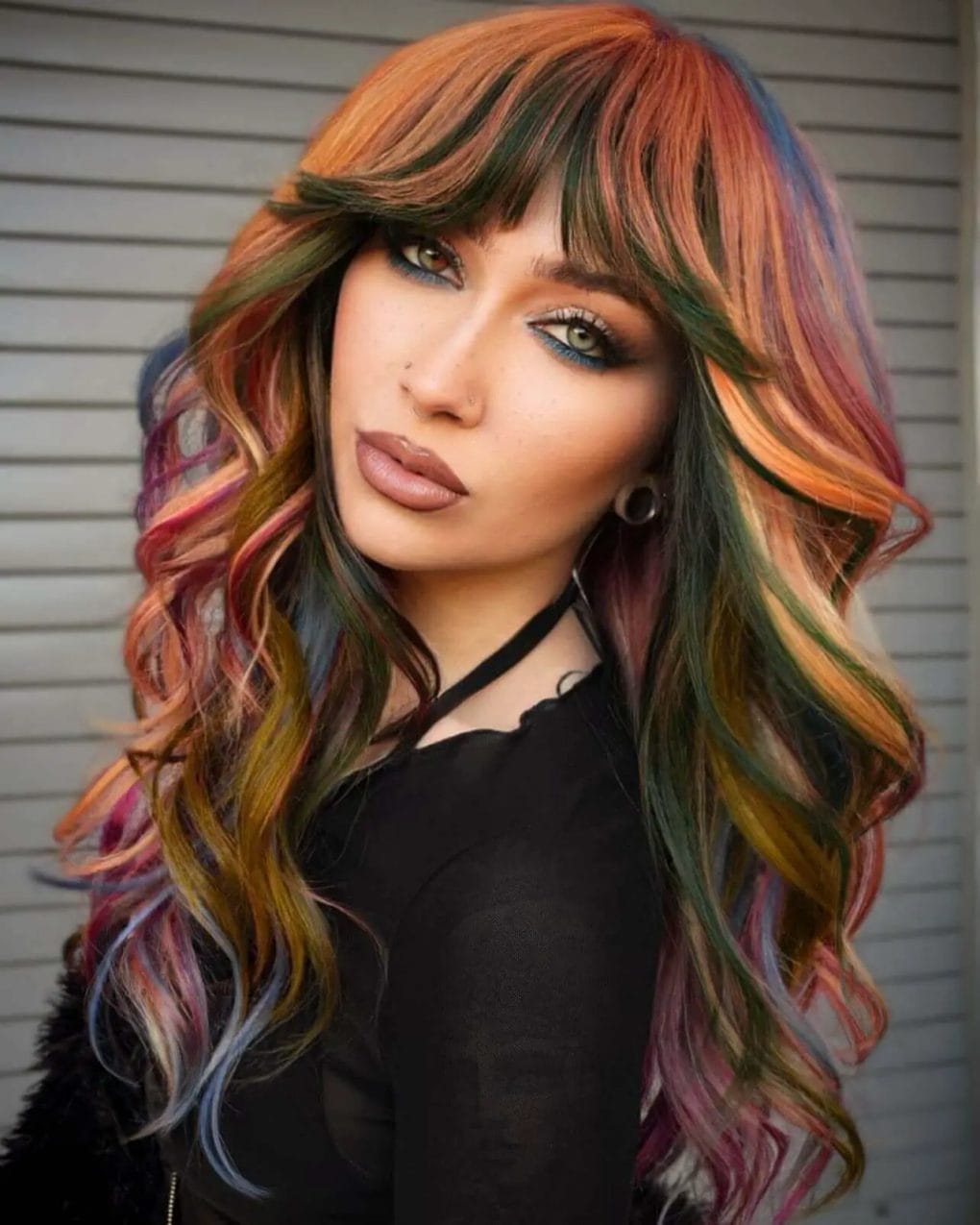 Multicolored waves with a vivid curtain bangs blend