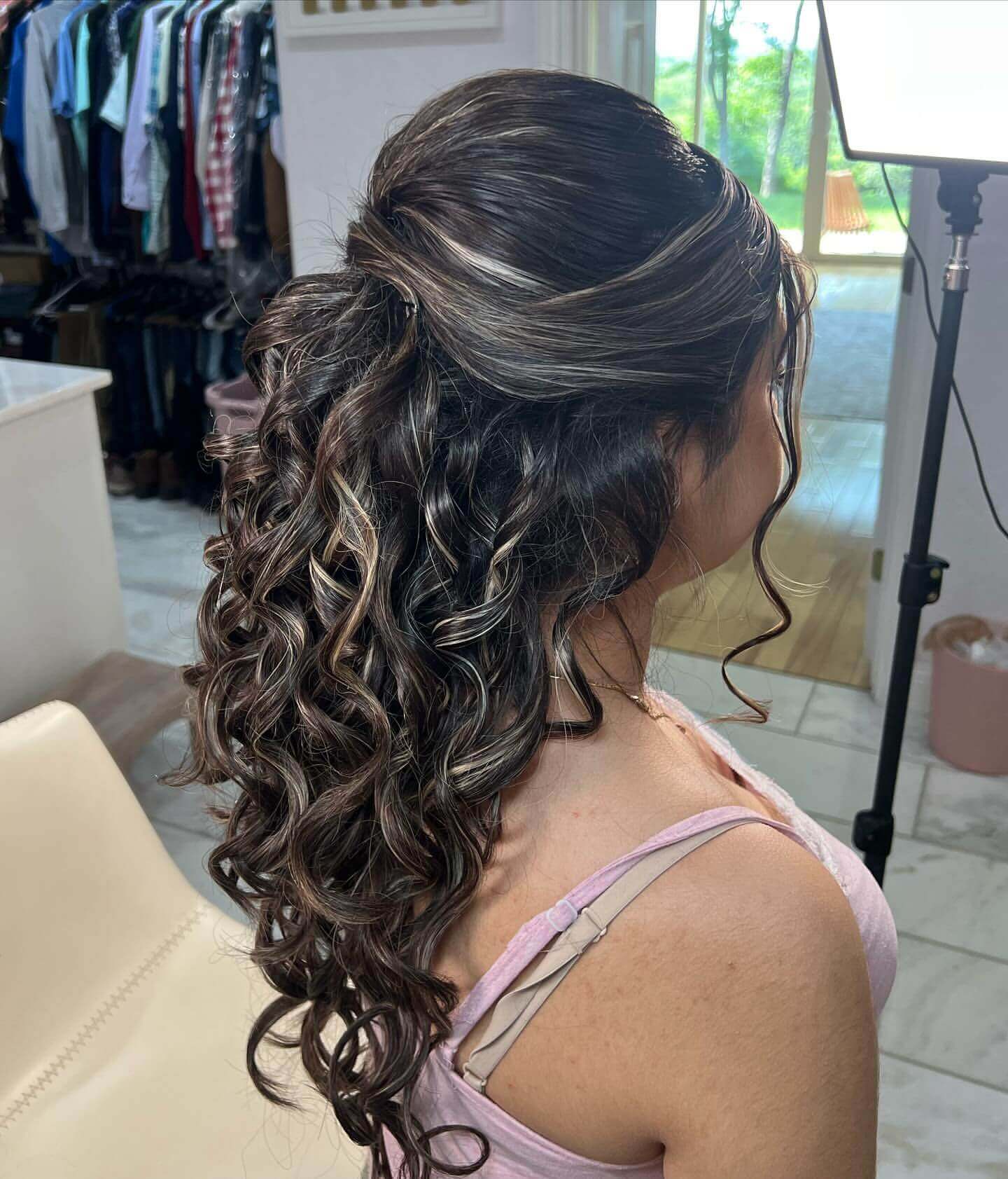Defined dark brown curls with polished top