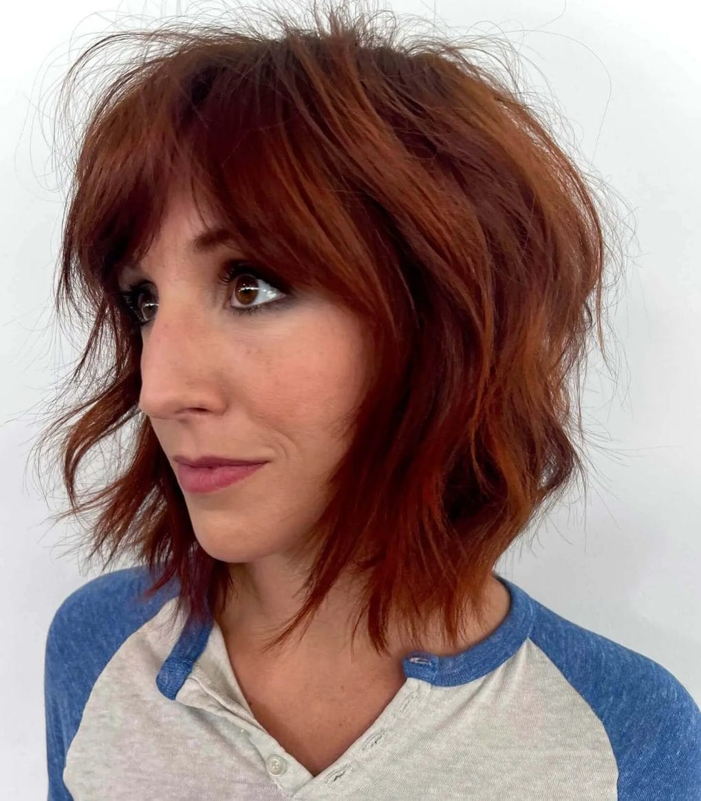Dynamic textured shaggy bob with light, airy fringe