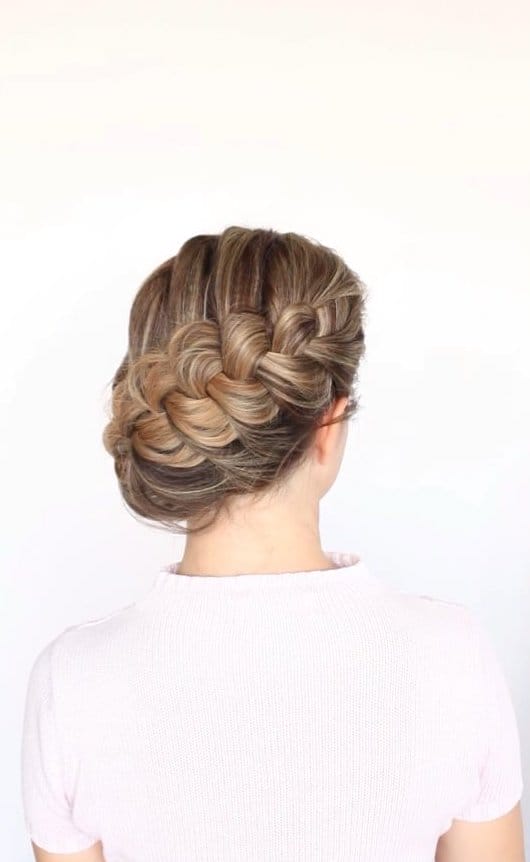 Elegant summer braided updo with intricate design