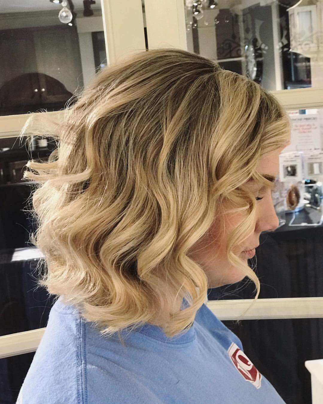Elegant medium-length bob with soft blonde waves