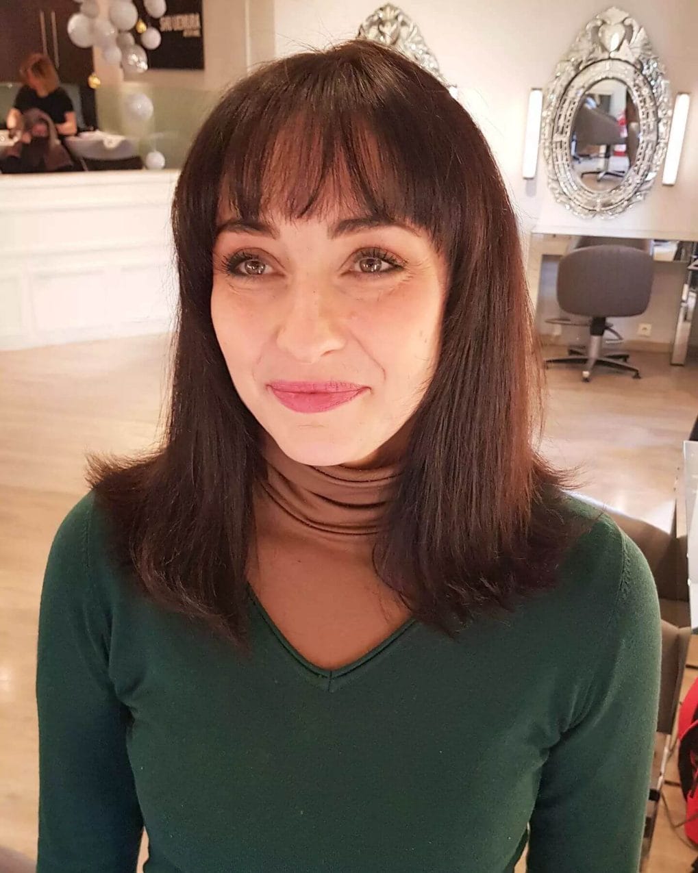 Elegant medium-length hair with feathered see-through bangs