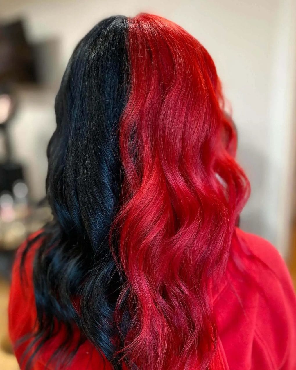 Fiery red fading to black with large elegant curls
