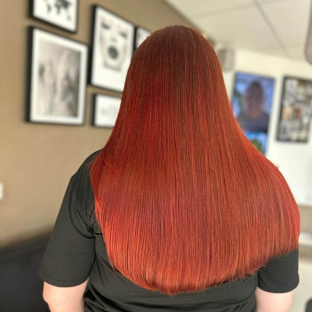 Glossy straight copper hair for bold look