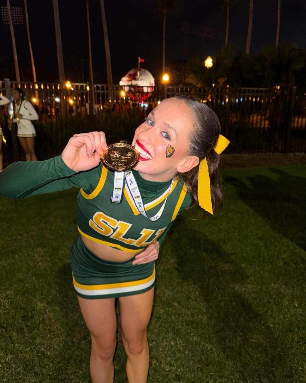 High ponytail in golden blonde for a sunny cheerleader look